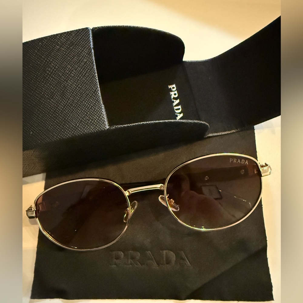 Prada Gold Frame Black Lens Oval Sunglasses